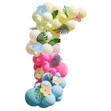 Blue, Pink, Green & Yellow Hawaiian Tiki Balloon Arch with Tropical Flowers and Foliage